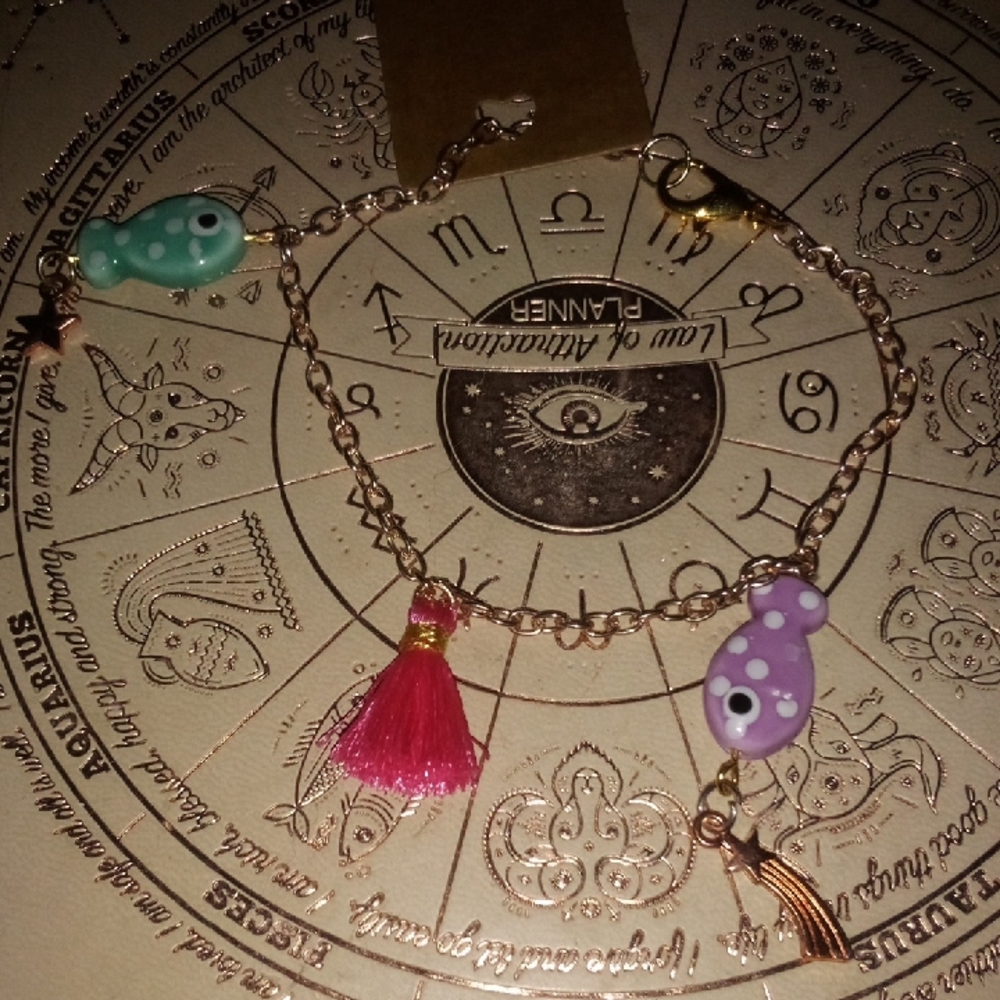 Charming Gold Bracelet with Pink Tassel and Fish Charms